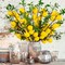 4pcs Artificial Lemon Branches, 19-inch vibrant yellow faux lemons with green leaves and bendable stems—perfect for home kitchen décor, garden displays, office desks, and summer party decorations.